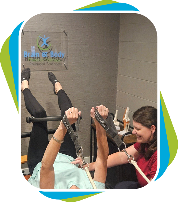One-On-One Physical Therapy with therapist providing hands on care to patient on Pilates reformer